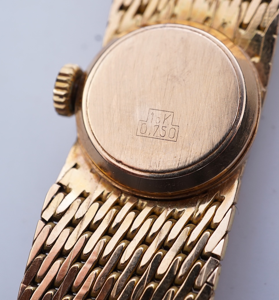 Ermaten, a gold watch